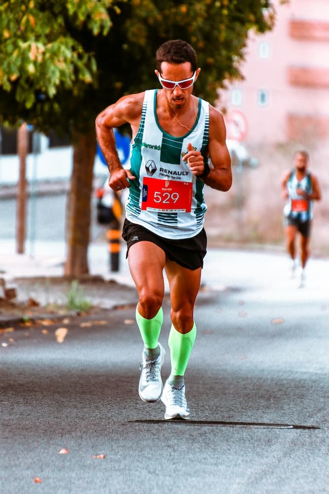 Marathon runner during endurance event representing unified event management
